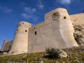 The ancient fortress of Al-Nakhal, rises above the old city of Muscat, Oman Royalty Free Stock Photo