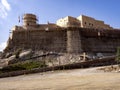 The ancient fortress of Al-Nakhal, rises above the old city of Muscat, Oman Royalty Free Stock Photo