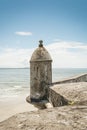 An ancient fortress by the beach. Built in a time long gone by, stands tall and proud on the edge of the beach.