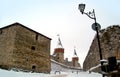 Ancient fortress, winter landscape, old town, fortress walls, street lamp Royalty Free Stock Photo