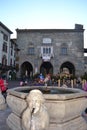 Ancient fountain and to a street show of famous movie characters.