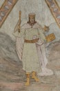 Ancient fresco of king Solomon with the temple and a scepter in his hands