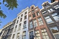 Ancient gabled mansions in historical canal belt, Amsterdam, Netherlands