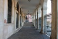 Gallery with columns in the street Venice Italy Royalty Free Stock Photo