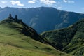 ancient georgian church in Guergetti on top of peak in caucasian mountains, picturesque scenic landscape, Royalty Free Stock Photo