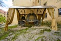 an ancient gilded carriage in the courtyard of the castle