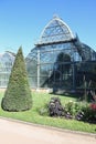 Glass and steel greenhouse in the public park in Lyon with many Royalty Free Stock Photo