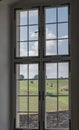 Ancient glass window with panoramic view Royalty Free Stock Photo
