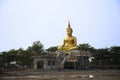 Ancient golden big buddha statue for thai people travel visit respect praying blessing wish mystery holy worship in Wat Lat Pla