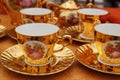 Ancient golden porcelain cups coffe or tea Royalty Free Stock Photo