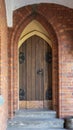 Ancient Gothic Church Portal Carved Wooden Door Church. Large Brown Antique Style Doors Full Frame. Royalty Free Stock Photo