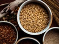 Ancient grains, nuts seeds health food in rustic low light setting.