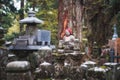 Ancient Gravestones with Jizo Statues in Okunoin Cemetery, Koyasan, Japan Royalty Free Stock Photo