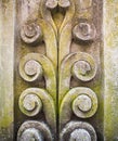 Ancient gray stone plate with ornament