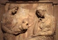 Ancient Greek bas-relief on grave stele, marble sculpture of women and child Royalty Free Stock Photo