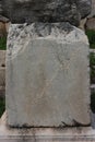 Ancient Greek inscription at Delphi, Greece Royalty Free Stock Photo