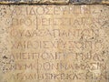 Greek inscription on a rock. Roman Theater in ancient Hierapolis. Pamukkale, Turkey Royalty Free Stock Photo