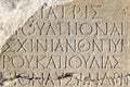 Ancient Greek inscription on stone at archaeological site of the ancient town of Heraclea Sintica, Rupite region, Bulgaria Royalty Free Stock Photo