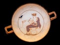 Ancient Greek plate at the Delphi museum in Greece Royalty Free Stock Photo