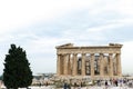 Ancient Greek ruins, columns, building. Tourists on excursions to the Acropolis, Athens, Greece Royalty Free Stock Photo