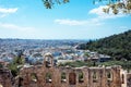 Ancient Greek ruins, ruins amidst lush green grass. Acropolis, Athens, Greece.eautiful view of the capital of Greece - Athens Royalty Free Stock Photo