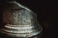 Ancient Greek script carved on stone column. Kyrenia, Cyprus