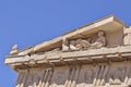 Ancient greek temple detail, man laying down statue Royalty Free Stock Photo