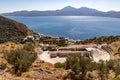 Ancient greek theather with Klima beach in background Royalty Free Stock Photo