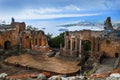 The Ancient Greek Theatre with Mount Etna behind in Taormina in Sicily, Italy, Europe