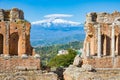 Ancient Greek Theatre In Taormina On Background Of Etna Volcano, Italy