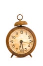 Ancient grunge and rusted alarm-clock on white