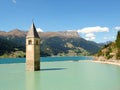 Ancient half-submerged bell tower in Graun im Vinschgau Royalty Free Stock Photo