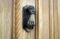 Ancient hand doorknocker from copper Royalty Free Stock Photo