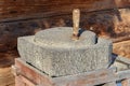 Ancient handmade millstone Royalty Free Stock Photo