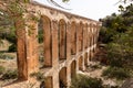 Ancient Haroune aqueduct near the archeological Roman city of Volubilis in Morocco