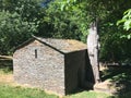 Ancient haunting stone house in the woods, in the Spanish trail.