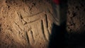 Ancient Hebrew Carving Revealed Under Sand