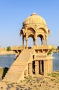 Ancient hindu stone temple beside lake Royalty Free Stock Photo