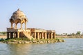 Ancient hindu stone temple in the middle of lake Royalty Free Stock Photo