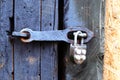 The ancient hinged iron castle on a door or gate