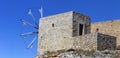 Ancient stone windmills Lassithi area, island Crete, Greece Royalty Free Stock Photo