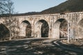 Old railway bridge in the Carpathian Mountains. Eastern Express Royalty Free Stock Photo