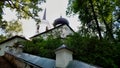 Ancient historical building of orthodox church cathedral in Pskov Hills grave of Pushkin