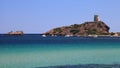 Ancient historical fortress in a bay with ships in the front