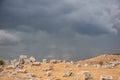 Ancient historical ruins in Pamukkale Turkey on the dramatic sky background Royalty Free Stock Photo