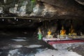 Ancient holy buddha statue in antique mystery cave for thai people travel visit respect praying blessing luck wish of Wat Khao