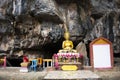 Ancient holy buddha statue in antique mystery cave for thai people traveler travel visit respect praying blessing wish of Wat Huai