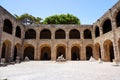 Ancient hospital and arch