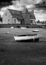 Ancient house and boats on a mooring - b&w Royalty Free Stock Photo