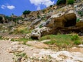 Ancient houses carved in the rock in Ginosa, Italy Royalty Free Stock Photo